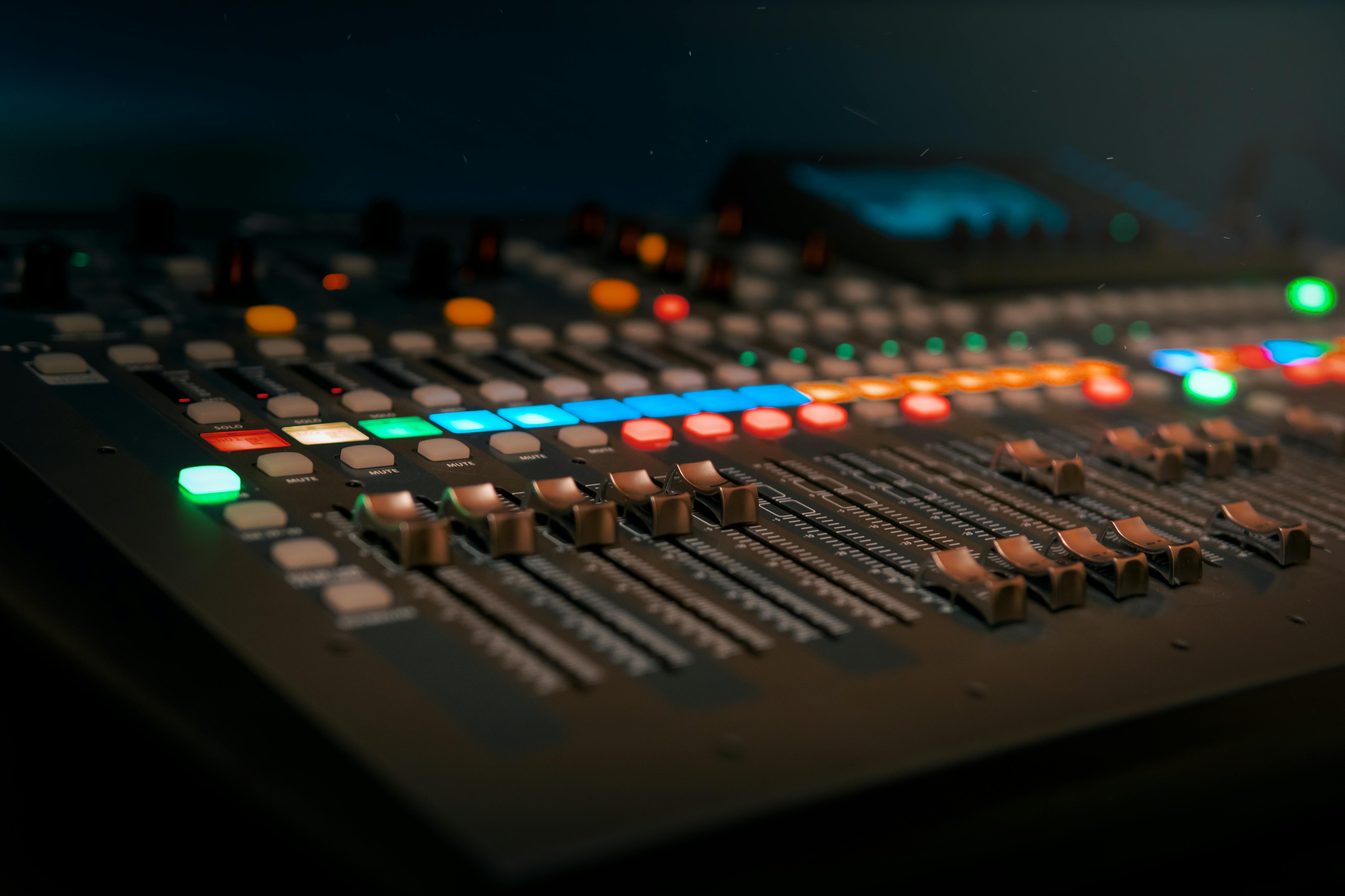 A futuristic audio workstation interface displaying waveforms.