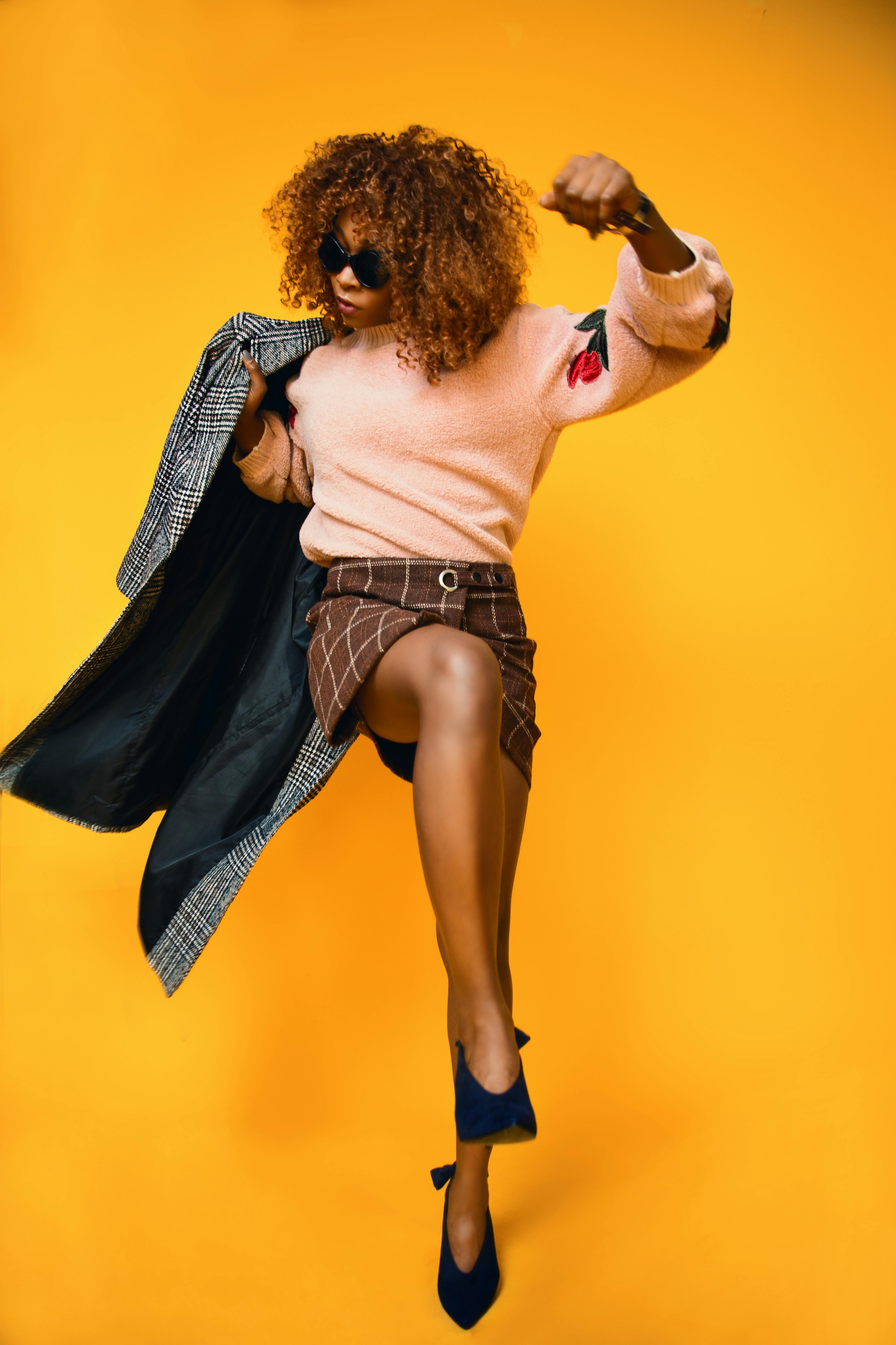 Artist holding microphone with energy and confidence